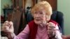 FILE - Guadalupe Portillo, who is 102, speaks during an interview in her Los Angeles home.