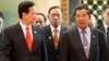 Vietnam's Prime Minister Nguyen Tan Dung (L) and his Cambodian couunterpart Hun Sen (R) talk as they walk to their lunch during the ASEAN Summit at the Prime Minister's Office in Bandar Seri Begawan April 25, 2013.