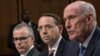 From left, acting FBI Director Andrew McCabe, Deputy Attorney General Rod Rosenstein, and From left, acting FBI Director Andrew McCabe, Deputy Attorney General Rod Rosenstein, and Director of National Intelligence Dan Coats, testify before a Senate Intelligence Committee hearing about the Foreign Intelligence Surveillance Act, on Capitol Hill, June 7, 2017, in Washington. 