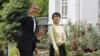 U.S. President Barack Obama and Burma's pro-democracy leader Aung Sann Suu Kyi meet at Suu Kyi's home in Rangoon, November 19, 2012.