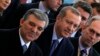 Turkish President Abdullah Gul (L) and Prime Minister Tayyip Erdogan (C) arrive at the opening ceremony of a new line of the Ankara Metro, in Ankara Turkey, Feb. 12, 2014.