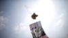 FILE - A balloon containing leaflets denouncing North Korean leader Kim Jong Un is seen near the demilitarized zone separating the two Koreas in Paju, South Korea, March 26, 2016.
