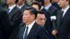 中国主席习近平和总理李克强抵达在北京的人民英雄纪念碑，参加向烈士致敬的仪式（2014年9月30日）