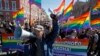 Participants march and shout slogans during a protest by gay rights activists in St. Petersburg May 1, 2013.