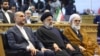 FILE - A handout picture provided by Iran's Presidency on December 23, 2023, shows, from left, Iran's Foreign Minister Hossein Amirabdollahian, President Ebrahim Raisi and Head of Iran's Judiciary Gholam Hossein Mohseni-Ejei.