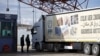 FILE - An aid truck enters Syria from Turkey at Turkey's Oncupinar border crossing on the Turkish-Syrian border in the southeastern city of Kilis, Turkey, Feb. 7, 2016.