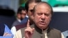Pakistan's Prime Minister Nawaz Sharif gestures as he speaks to media after appearing before a Joint Investigation Team (JIT) in Islamabad, Pakistan June 15, 2017. REUTERS/Faisal Mahmood - RC195DD99440