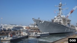 FILE - The Arleigh Burke-class guided-missile destroyer USS John S. McCain. 