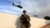 A U.S. Army soldier stands with his weapon at a military base in the Makhmour area near Mosul during an operation to attack Islamic State militants in Mosul, Iraq, Oct. 18, 2016.