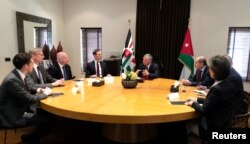 Jordan's King Abdullah meets with Senior White House Advisor Jared Kushner, center, in Amman, Jordan, May 29, 2019.