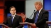 Republican U.S. presidential candidate Marco Rubio listens as rival candidate Donald Trump speaks at the U.S. Republican presidential candidates debate in Detroit, Michigan, March 3, 2016.