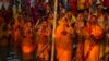 Hindu devotees gather by the river Brahmaputra and offer prayers to the setting sun during Chhath festival in Guwahati, northeastern Assam state, India, Nov. 7, 2024. 
