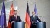 FILE - German Chancellor Olaf Scholz, right, and Chinese Premier Li Qiang, brief the media following government consultations of the both countries at the chancellery in Berlin, Germany, June 20, 2023.