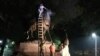 Workers remove the monuments to Robert E. Lee, commander of the pro-slavery Confederate army in the American Civil War, and Thomas "Stonewall" Jackson, a Confederate general, from Wyman Park in Baltimore, Maryland, U.S. Aug. 16, 2017. 
