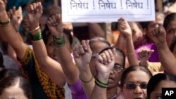 Activist of Hindu Janajagruti Samiti, or Hindu Awareness Forum, shout slogans against the government's attempts to block social media accounts and websites, August 24, 2012.