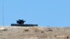 A rocket launcher is positioned at a military base on the Turkish-Syrian border town of Reyhanli, in Hatay province, southern Turkey, Sept. 5, 2013. 