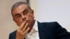 FILE - In this Sept. 29, 2020, file photo, former Nissan Motor Co. Chairman Carlos Ghosn holds a press conference at the Maronite Christian Holy Spirit University of Kaslik, as he launches an initiative to help Lebanon that is undergoing a severe…