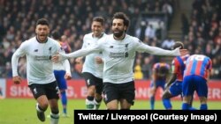 Les jouer de Liverpool jubilent après un 2e but contre Crystal Palace, Angleterre, le 31 mars 2018. 