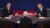 Republican presidential nominee Mitt Romney and President Obama answer a question during the third presidential debate focused mostly on the Middle East, October 22