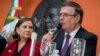 Mexican Foreign Minister Marcelo Ebrard, right, accompanied by Mexican Ambassador to the U.S. Martha Barcena, speaks during a news conference at the Mexican Embassy in Washington, June 3, 2019.