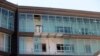 A rocket-propelled grenade damaged Libyan government offices in Tripoli June 4, 2014.