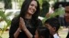 FILE - Hollywood actress Angelina Jolie smiles before a press conference in Siem Reap province, Cambodia, Feb. 18, 2017. 