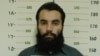 Anas Haqqani, a senior leader of the Haqqani network, arrested by the Afghan Intelligence Service (NDS) in Khost province is seen in this handout picture released October 16, 2014. Afghan forces arrested the son of the feared Haqqani network's founder alo
