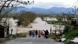 VOA Asia – Powerful storms batter the Pacific and Atlantic