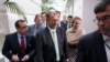 Speaker of the House John Boehner of Ohio, is surrounded by reporters on Capitol Hill in Washington, Aug. 1, 2014, after a closed-door meeting of House Republicans to discuss the border crisis. 