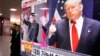 A TV screen shows pictures of U.S. President-elect Donald Trump, right, and North Korean leader Kim Jong Un, at the Seoul Railway Station in Seoul, South Korea, Nov. 10, 2016. 
