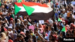 Masu zanga zanga a birnin Khartoum na Sudan, Yuli 18, 2019. 