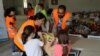 Children donate food to provide support to residents of Beirut, following Tuesday's blast, in Nicosia, Cyprus, Aug. 7, 2020.