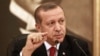 FILE - Turkey's Prime Minister Recep Tayyip Erdogan talks to the media in Istanbul.