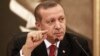 FILE - Turkey's Prime Minister Recep Tayyip Erdogan talks to the media in Istanbul.
