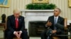 FILE - U.S. President Barack Obama, right, meets with President-elect Donald Trump in the Oval Office of the White House in Washington, Nov. 10, 2016.