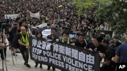 Mutane yankin Hong Kong da suke zanga zanga