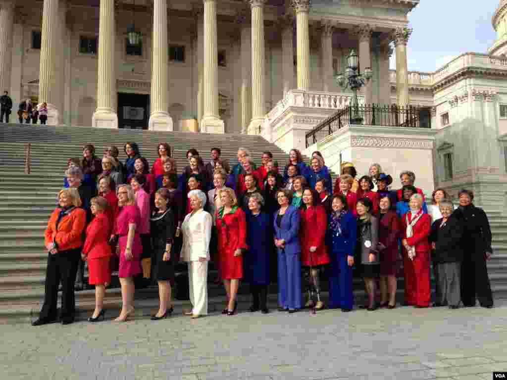 Women members of Congress gather in front of the Capitol, Washington, January 3, 2013. 