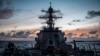 The guided-missile destroyer USS Dewey transits the Pacific Ocean while participating in Rim of the Pacific Exercise (RIMPAC), July 10, 2018.