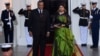 King Mswati III of Swaziland and wife Inkhosikati La Mbikiza arrive for a dinner hosted by President Barack Obama for the U.S.-Africa Leaders Summit, at the White House in Washington, Aug. 5, 2014.