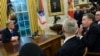 President Donald Trump, left, listens as U.S. Trade Representative Robert Lighthizer, second from right, talks with Chinese Vice Premier Liu He, second from left, during their meeting in the Oval Office of the White House in Washington, Feb. 22, 2019. 