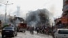 Firefighters work at one explosion site in Reyhanli, near Turkey's border with Syria, May 11, 2013.