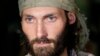 2011 FILE - Matthew VanDyke, who spent months in Libyan prisons, speaks with reporters after his flight arrived at Baltimore-Washington International Airport in Linthicum, Maryland.