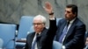 Russian Ambassador Vitaly Churkin vetoes a draft resolution that demanded an immediate end to airstrikes and military flights over Aleppo, Syria, at U.N. Headquarters in New York, Oct. 8, 2016.