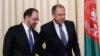 Russian Foreign Minister Sergei Lavrov and his Afghan counterpart Salahuddin Rabbani arrive for a joint news conference following their meeting in Moscow, Russia, Feb. 7, 2017. Russia has hinted at involving the U.S. in a new regional dialogue on Afghanistan.