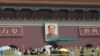 Seorang polisi paramiliter China mengamati Gerbang Tiananmen di Beijing, China 4 Juni 2024. (Foto: Ng Han Guan/AP)