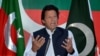 FILE - Followers of Pakistani opposition leader Imran Khan, shown at an April press conference, have planned a demonstration seeking the resignation of Prime Minister Nawaz Sharif. The government on Thursday banned political gatherings in Islamabad.