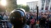 Pro-Russian activists hold a rally near the headquarters of the regional interior ministry to demand the resignation of its head Anatoly Naumenko in Luhansk, eastern Ukraine, May 7, 2014.