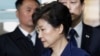 FILE - Ousted South Korean President Park Geun-hye arrives at the Seoul Central District Court for a hearing on a prosecutors' request for her arrest for corruption, in Seoul, South Korea, March 30, 2017.