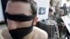 Syrian opposition members take part in a demonstration calling for more human rights in Syria, including putting a stop to physical torture in prisons, Beirut, Lebanon, December 10, 2009. 