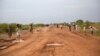 FILE - Civilians flee from renewed attacks in Bentiu, Unity state of South Sudan, April 20, 2014.